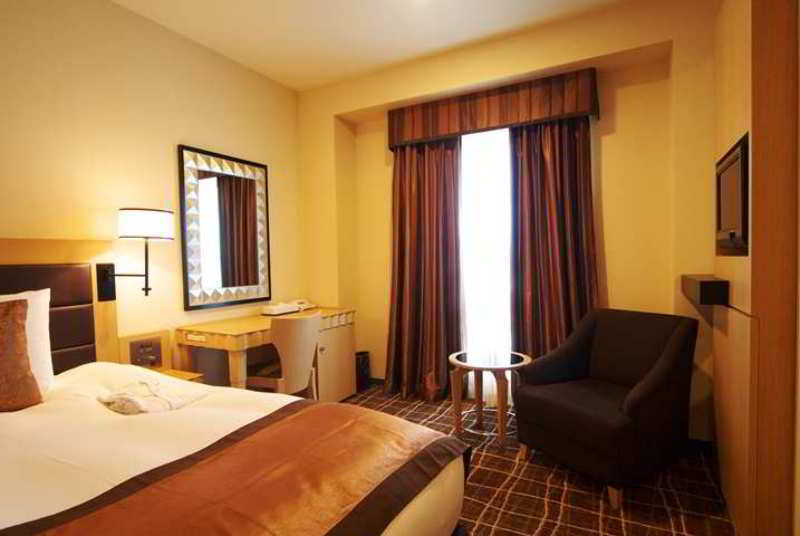 Doubletree By Hilton Naha Hotell Rom bilde
